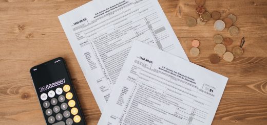 Image of tax forms and calculator.